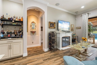 SPECTACULAR AND METICULOUSLY MAINTAINED THREE BEDROOM, DEN, 3 on Esplanade Golf and Country at Lakewood Ranch in Florida - for sale on GolfHomes.com, golf home, golf lot