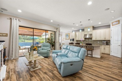SPECTACULAR AND METICULOUSLY MAINTAINED THREE BEDROOM, DEN, 3 on Esplanade Golf and Country at Lakewood Ranch in Florida - for sale on GolfHomes.com, golf home, golf lot