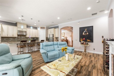 SPECTACULAR AND METICULOUSLY MAINTAINED THREE BEDROOM, DEN, 3 on Esplanade Golf and Country at Lakewood Ranch in Florida - for sale on GolfHomes.com, golf home, golf lot
