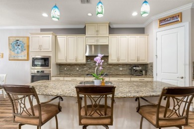 SPECTACULAR AND METICULOUSLY MAINTAINED THREE BEDROOM, DEN, 3 on Esplanade Golf and Country at Lakewood Ranch in Florida - for sale on GolfHomes.com, golf home, golf lot