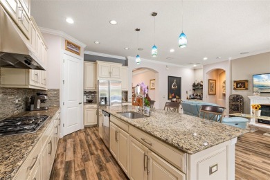 SPECTACULAR AND METICULOUSLY MAINTAINED THREE BEDROOM, DEN, 3 on Esplanade Golf and Country at Lakewood Ranch in Florida - for sale on GolfHomes.com, golf home, golf lot