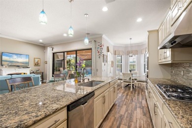 SPECTACULAR AND METICULOUSLY MAINTAINED THREE BEDROOM, DEN, 3 on Esplanade Golf and Country at Lakewood Ranch in Florida - for sale on GolfHomes.com, golf home, golf lot
