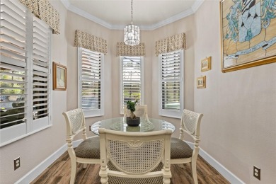 SPECTACULAR AND METICULOUSLY MAINTAINED THREE BEDROOM, DEN, 3 on Esplanade Golf and Country at Lakewood Ranch in Florida - for sale on GolfHomes.com, golf home, golf lot