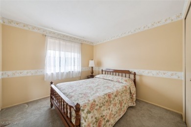 Welcome to this Mansard-roofed townhome nestled in the serene on Ridgewood Golf Course in Ohio - for sale on GolfHomes.com, golf home, golf lot