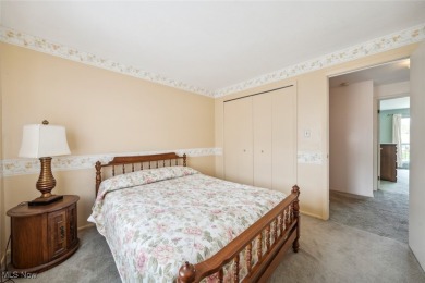 Welcome to this Mansard-roofed townhome nestled in the serene on Ridgewood Golf Course in Ohio - for sale on GolfHomes.com, golf home, golf lot