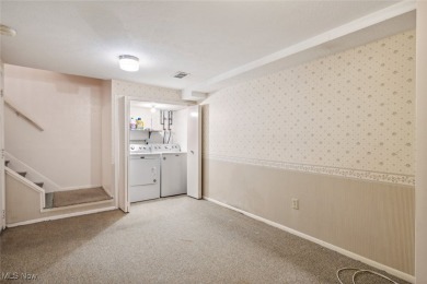 Welcome to this Mansard-roofed townhome nestled in the serene on Ridgewood Golf Course in Ohio - for sale on GolfHomes.com, golf home, golf lot