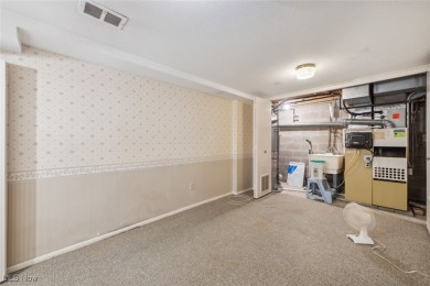 Welcome to this Mansard-roofed townhome nestled in the serene on Ridgewood Golf Course in Ohio - for sale on GolfHomes.com, golf home, golf lot