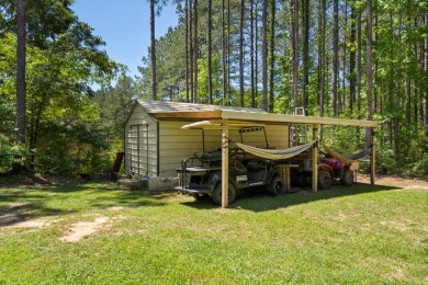 Welcome to your dream home in the serene Beaver Lake Subdivision on Pine Creek Golf Club in Mississippi - for sale on GolfHomes.com, golf home, golf lot