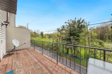 Welcome to this Mansard-roofed townhome nestled in the serene on Ridgewood Golf Course in Ohio - for sale on GolfHomes.com, golf home, golf lot
