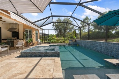 SPECTACULAR AND METICULOUSLY MAINTAINED THREE BEDROOM, DEN, 3 on Esplanade Golf and Country at Lakewood Ranch in Florida - for sale on GolfHomes.com, golf home, golf lot