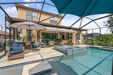 SPECTACULAR AND METICULOUSLY MAINTAINED THREE BEDROOM, DEN, 3 on Esplanade Golf and Country at Lakewood Ranch in Florida - for sale on GolfHomes.com, golf home, golf lot
