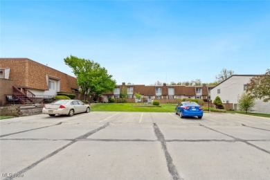 Welcome to this Mansard-roofed townhome nestled in the serene on Ridgewood Golf Course in Ohio - for sale on GolfHomes.com, golf home, golf lot