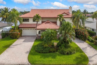 Nestled in the prestigious Country Club of Miami Estates, this on Country Club of Miami in Florida - for sale on GolfHomes.com, golf home, golf lot