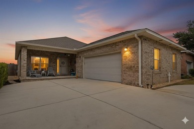 Welcome to the newest custom brick patio home built in Oak on Tiger Point Golf and Country Club in Florida - for sale on GolfHomes.com, golf home, golf lot