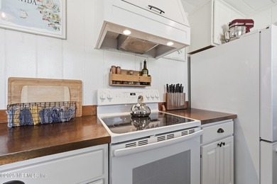 Just a 3-4 minutes walk to the ocean, this updated beach cottage on Jacksonville Beach Golf Course in Florida - for sale on GolfHomes.com, golf home, golf lot