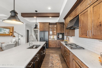 Experience upscale, low-maintenance living in this beautifully on Rarity Bay Country Club - Loudon in Tennessee - for sale on GolfHomes.com, golf home, golf lot