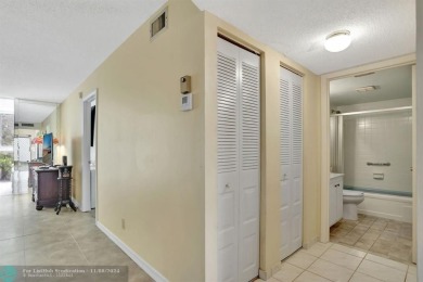 ALL IMPACT WINDOWS, BEAUTIFUL STAINLESS APPLIANCES WASHER DRYER on Oriole Golf and Tennis Club in Florida - for sale on GolfHomes.com, golf home, golf lot