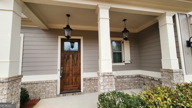 Welcome home to this beautifully refreshed 5-bedroom Craftsman on Traditions of Braselton Golf Club in Georgia - for sale on GolfHomes.com, golf home, golf lot