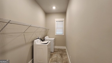 Welcome home to this beautifully refreshed 5-bedroom Craftsman on Traditions of Braselton Golf Club in Georgia - for sale on GolfHomes.com, golf home, golf lot