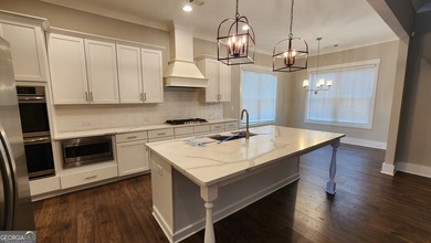 Welcome home to this beautifully refreshed 5-bedroom Craftsman on Traditions of Braselton Golf Club in Georgia - for sale on GolfHomes.com, golf home, golf lot