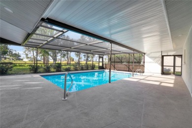 Under contract-accepting backup offers. Stunning Pool Home with on Rotonda Golf and Country Club The Hills Course in Florida - for sale on GolfHomes.com, golf home, golf lot