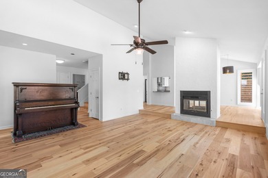 Welcome to this beautifully updated 4-bedroom home perfectly on Canongate At Flat Creek Club in Georgia - for sale on GolfHomes.com, golf home, golf lot