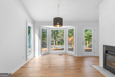 Welcome to this beautifully updated 4-bedroom home perfectly on Canongate At Flat Creek Club in Georgia - for sale on GolfHomes.com, golf home, golf lot