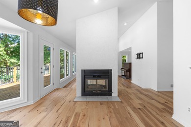 Welcome to this beautifully updated 4-bedroom home perfectly on Canongate At Flat Creek Club in Georgia - for sale on GolfHomes.com, golf home, golf lot