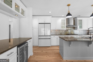 Welcome to this beautifully updated 4-bedroom home perfectly on Canongate At Flat Creek Club in Georgia - for sale on GolfHomes.com, golf home, golf lot