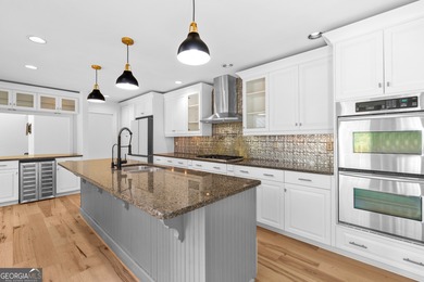 Welcome to this beautifully updated 4-bedroom home perfectly on Canongate At Flat Creek Club in Georgia - for sale on GolfHomes.com, golf home, golf lot