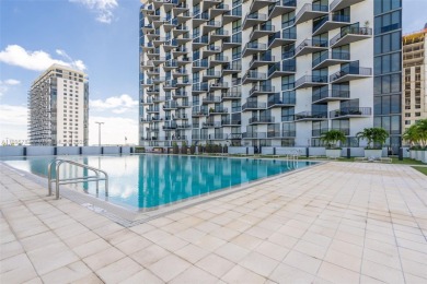 Live the urban lifestyle at 5252 Paseo! Bright and modern 1 on Doral Golf Resort in Florida - for sale on GolfHomes.com, golf home, golf lot