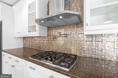 Welcome to this beautifully updated 4-bedroom home perfectly on Canongate At Flat Creek Club in Georgia - for sale on GolfHomes.com, golf home, golf lot