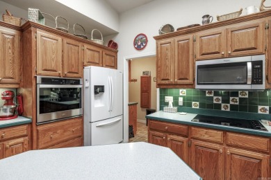 Welcome to this exceptionally well-maintained 3 bed 2.5  bath on Ponce De Leon Golf Course in Arkansas - for sale on GolfHomes.com, golf home, golf lot