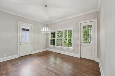 Discover one of the most exceptional locations in Governors on The Governors Towne Club in Georgia - for sale on GolfHomes.com, golf home, golf lot