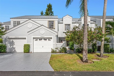 Welcome to this beautifully renovated 3-bed, 2.5-bath townhome on The Boca Country Club in Florida - for sale on GolfHomes.com, golf home, golf lot