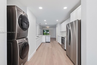 Welcome to this beautifully renovated 3-bed, 2.5-bath townhome on The Boca Country Club in Florida - for sale on GolfHomes.com, golf home, golf lot