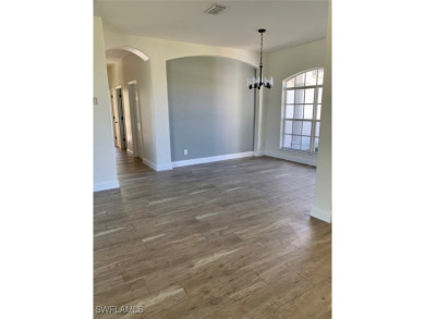 Come see this beautiful 4 Bedroom/3 Bathroom home with a on Royal Tee Country Club in Florida - for sale on GolfHomes.com, golf home, golf lot