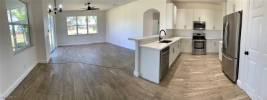 Come see this beautiful 4 Bedroom/3 Bathroom home with a on Royal Tee Country Club in Florida - for sale on GolfHomes.com, golf home, golf lot