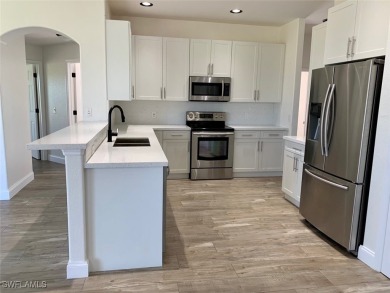 Come see this beautiful 4 Bedroom/3 Bathroom home with a on Royal Tee Country Club in Florida - for sale on GolfHomes.com, golf home, golf lot