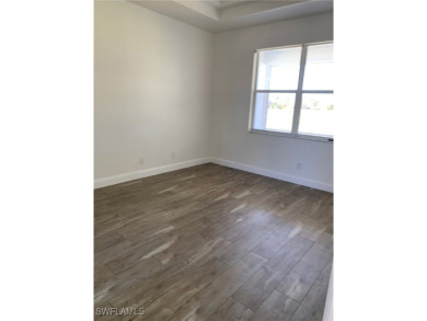 Come see this beautiful 4 Bedroom/3 Bathroom home with a on Royal Tee Country Club in Florida - for sale on GolfHomes.com, golf home, golf lot
