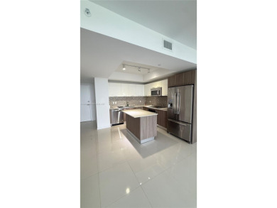 Modern High-rise in Doral. Large One bed,one bath on 15 th floor on  in Florida - for sale on GolfHomes.com, golf home, golf lot