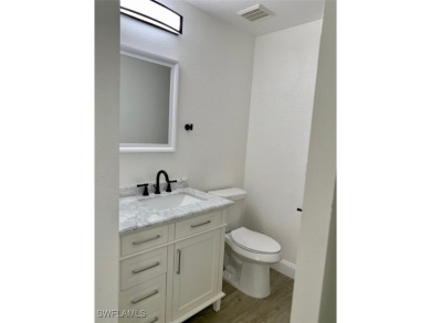 Come see this beautiful 4 Bedroom/3 Bathroom home with a on Royal Tee Country Club in Florida - for sale on GolfHomes.com, golf home, golf lot
