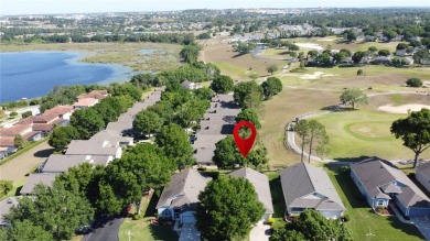 Great views of the city & golf course. Popular Canterbury model on Kings Ridge Golf Club in Florida - for sale on GolfHomes.com, golf home, golf lot