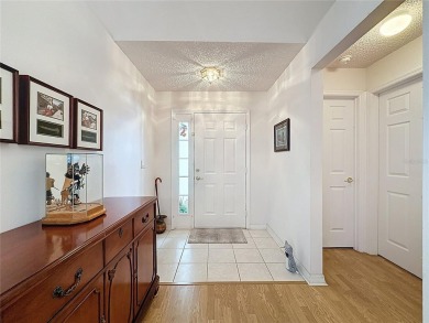 Great views of the city & golf course. Popular Canterbury model on Kings Ridge Golf Club in Florida - for sale on GolfHomes.com, golf home, golf lot