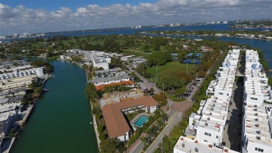 Experience elevated waterfront living in the heart of Miami on Normandy Shores Golf Course in Florida - for sale on GolfHomes.com, golf home, golf lot