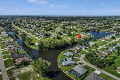 Welcome to this stunning waterfront residence in Cape Coral on Palmetto-Pine Country Club in Florida - for sale on GolfHomes.com, golf home, golf lot