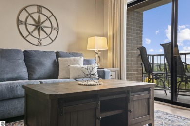 Absolutely stunning 1BR with views of East Bay from main living on  in Michigan - for sale on GolfHomes.com, golf home, golf lot