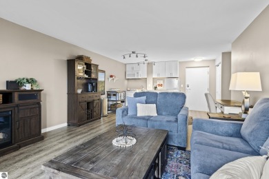 Absolutely stunning 1BR with views of East Bay from main living on  in Michigan - for sale on GolfHomes.com, golf home, golf lot