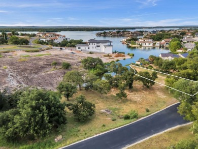 Discover your perfect lakefront escape on the controlled-level on Apple Rock Golf Course - Horseshoe Bay in Texas - for sale on GolfHomes.com, golf home, golf lot