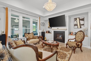 Situated atop a spacious corner lot in Hasentree, this on Hasentree Club in North Carolina - for sale on GolfHomes.com, golf home, golf lot